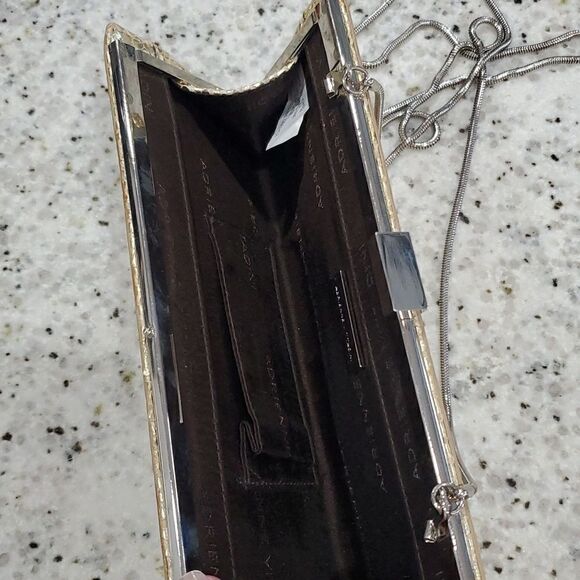 Adrienne Vittadini womans gold leather clutch with cross body strap - Picture 6 of 8